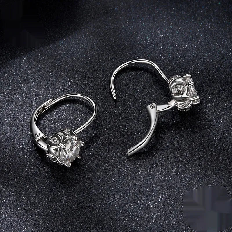 Sterling silver flower bud ear clips with moissanite stone and white gold plating