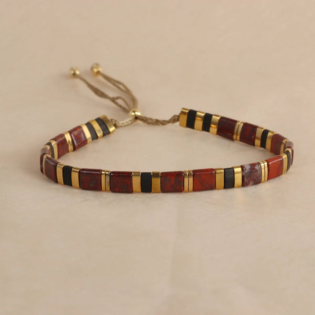Adjustable glass beaded bracelet in geometric design with round beads available in five colours