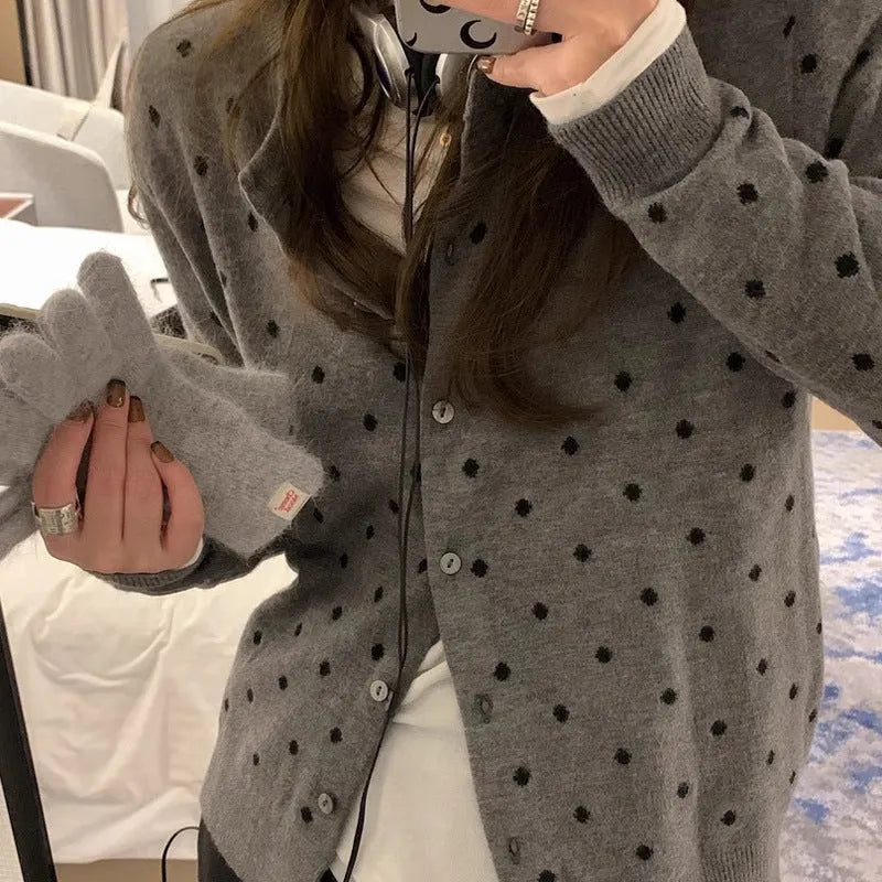 Women's gray dot knitted cardigan with crocheted flowers in black or gray.