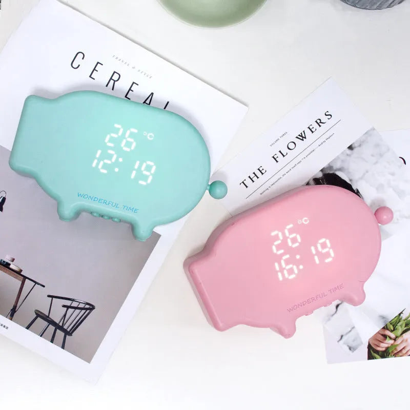 Blue or pink multifunctional LED alarm clock with temperature display and USB charging port