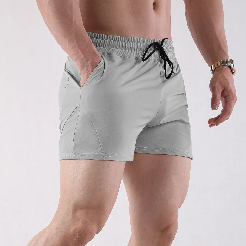 Men's thin polyester basketball shorts in grey colour with elastic waistband