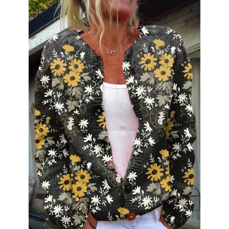 Yellow women's knitted cardigan coat with a raised 3D pattern, shown unbuttoned.