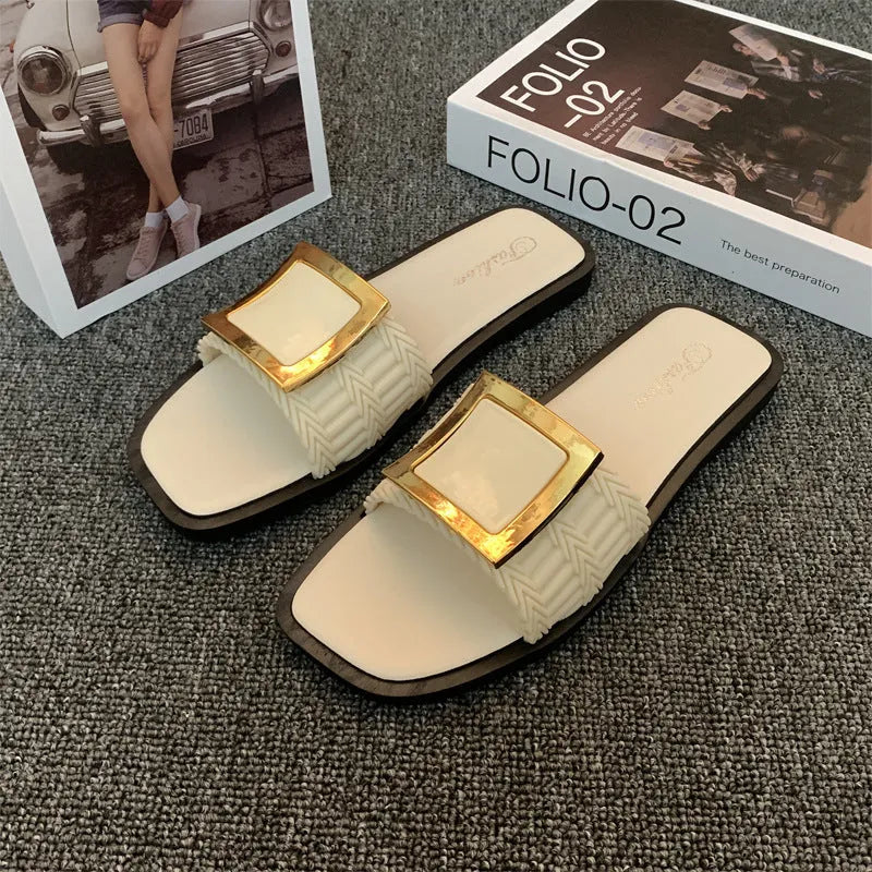 Women's casual flat slippers in apricot, black and khaki with a textured PVC sole.