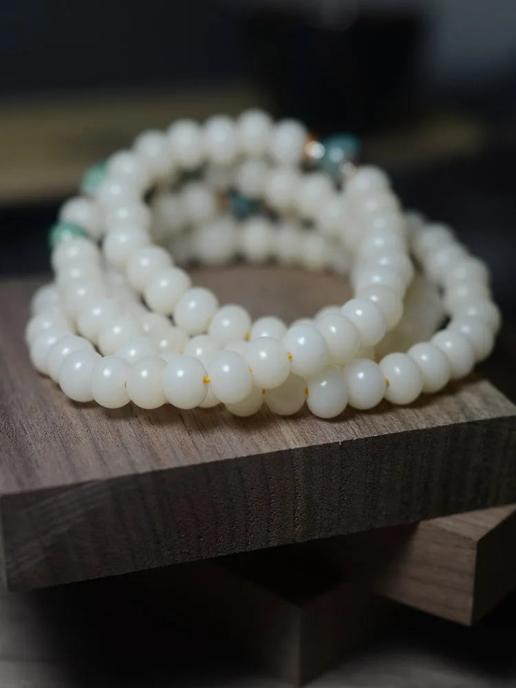 White jade bodhi root bracelet with 108 flat round beads in unisex national style.