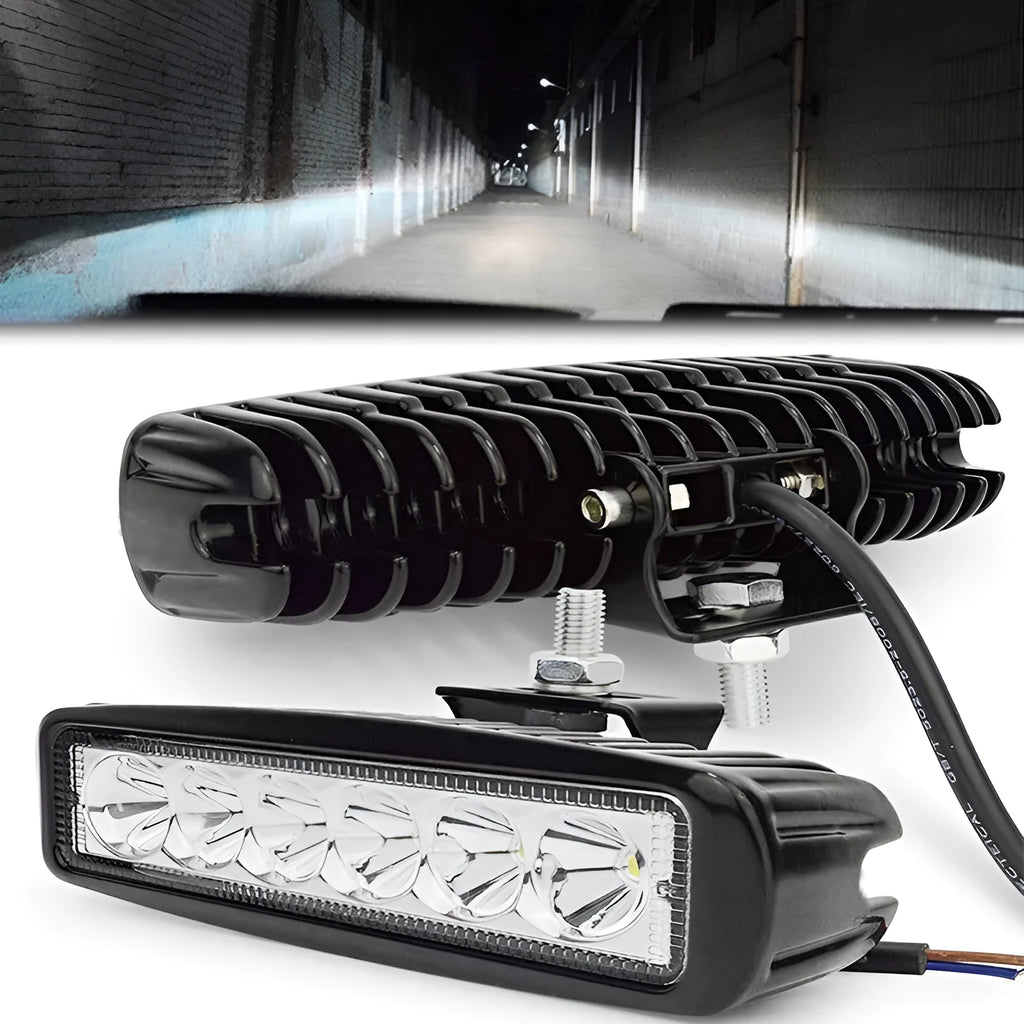Black automotive auxiliary spotlight with die-cast aluminium housing and polycarbonate cover