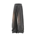 Straight-leg fleece-lined trousers in black, dark grey and light grey, showing elastic waistband.