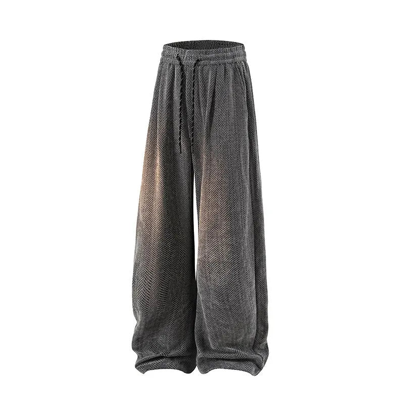 Straight-leg fleece-lined trousers in black, dark grey and light grey, showing elastic waistband.