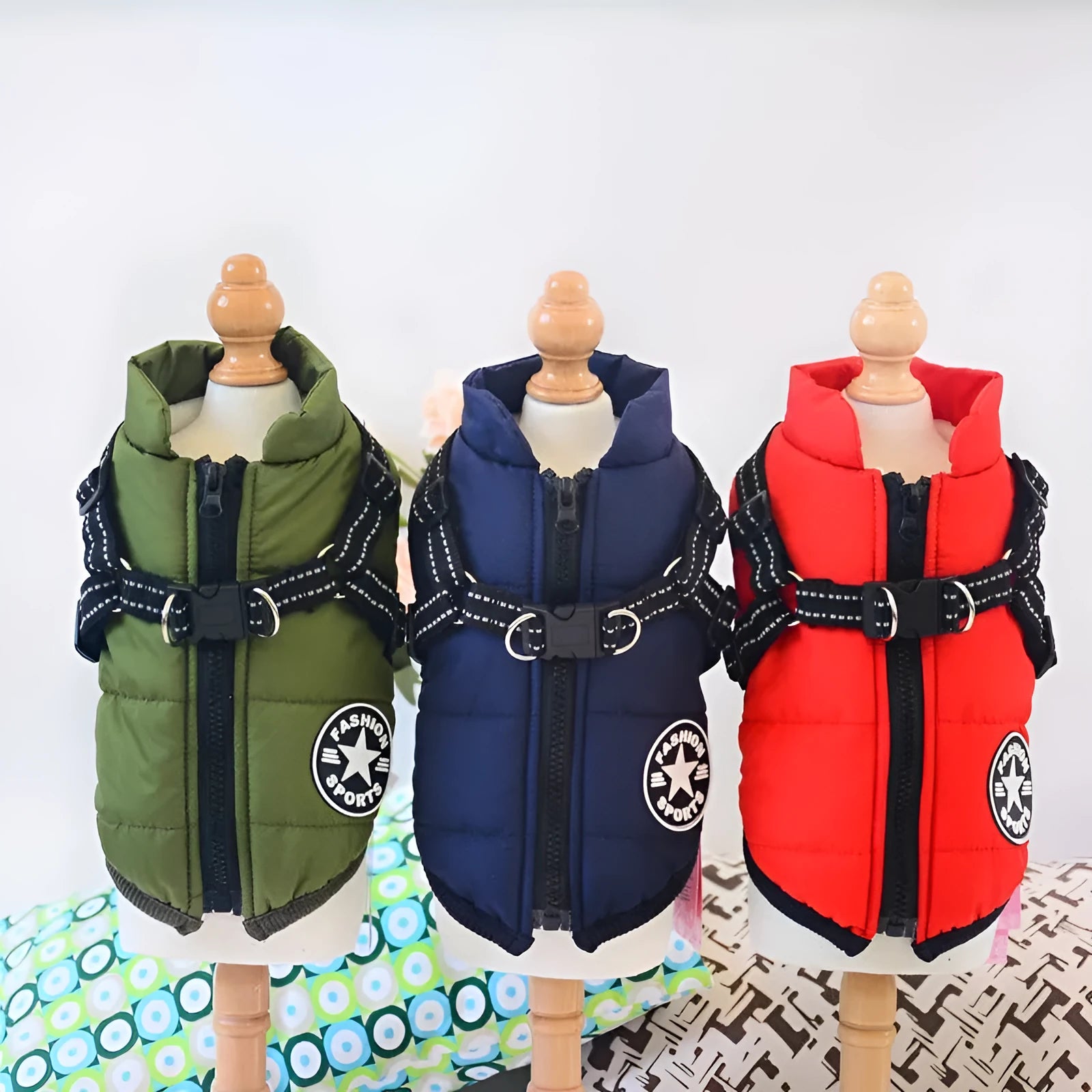 Waterproof dog coat with harness opening in rain silk material available in multiple colours and sizes