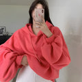 Women's loose mulberry silk hooded sweater in watermelon red colour without sleeves