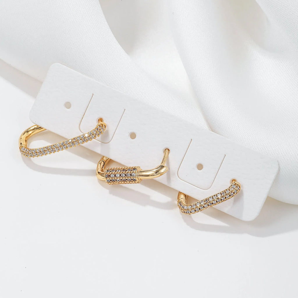 Geometric copper ear clip three-piece set with micro inlaid zircon detailing in gold and white colours