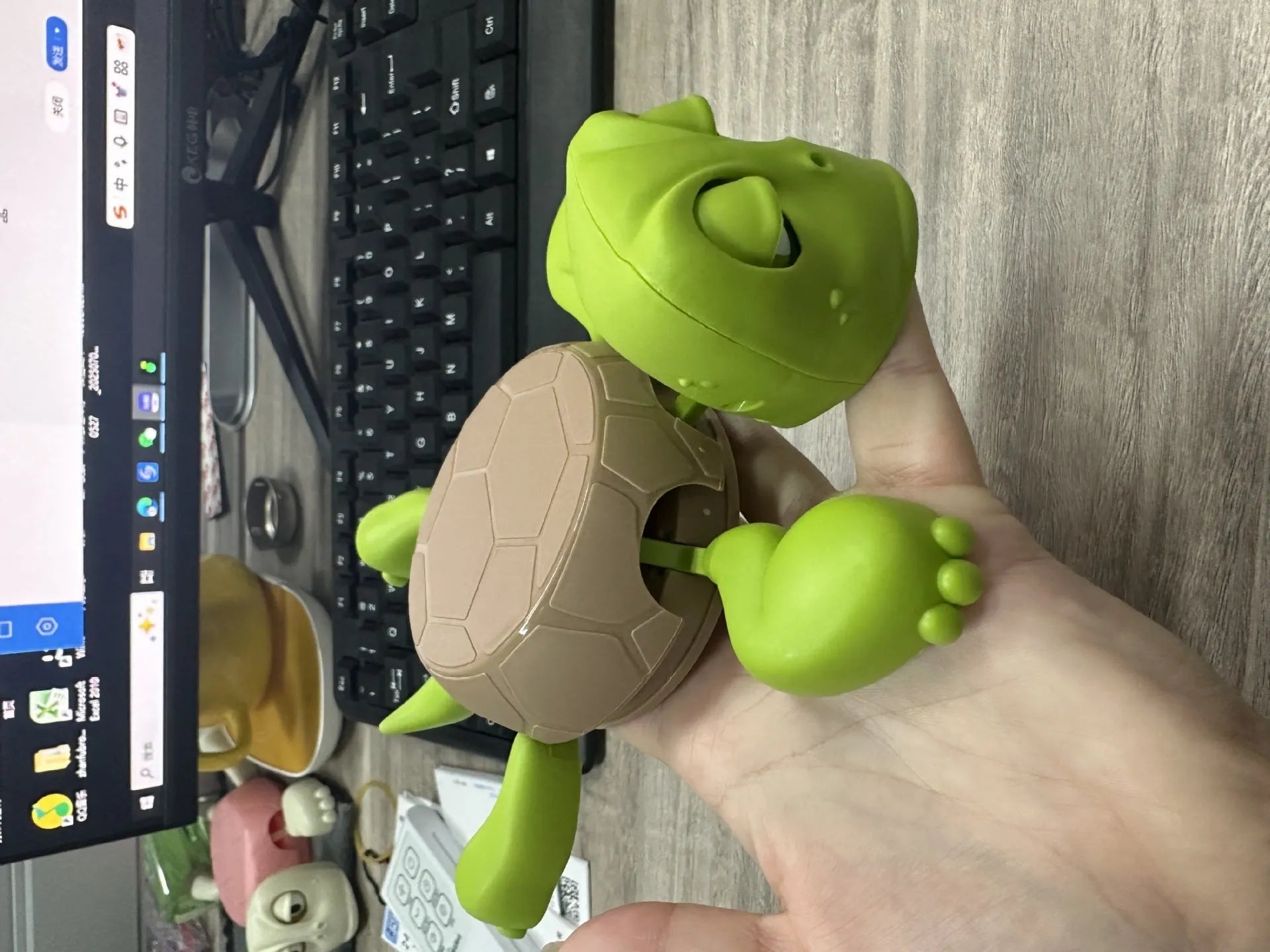 Turtle-shaped ABS plastic coaster in one of four colour options: dark green, light green, wheat starch, or yellow