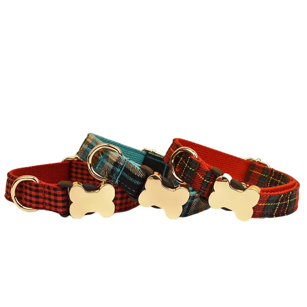 Flat nylon dog collar with bone buckle in assorted colours on a white background.