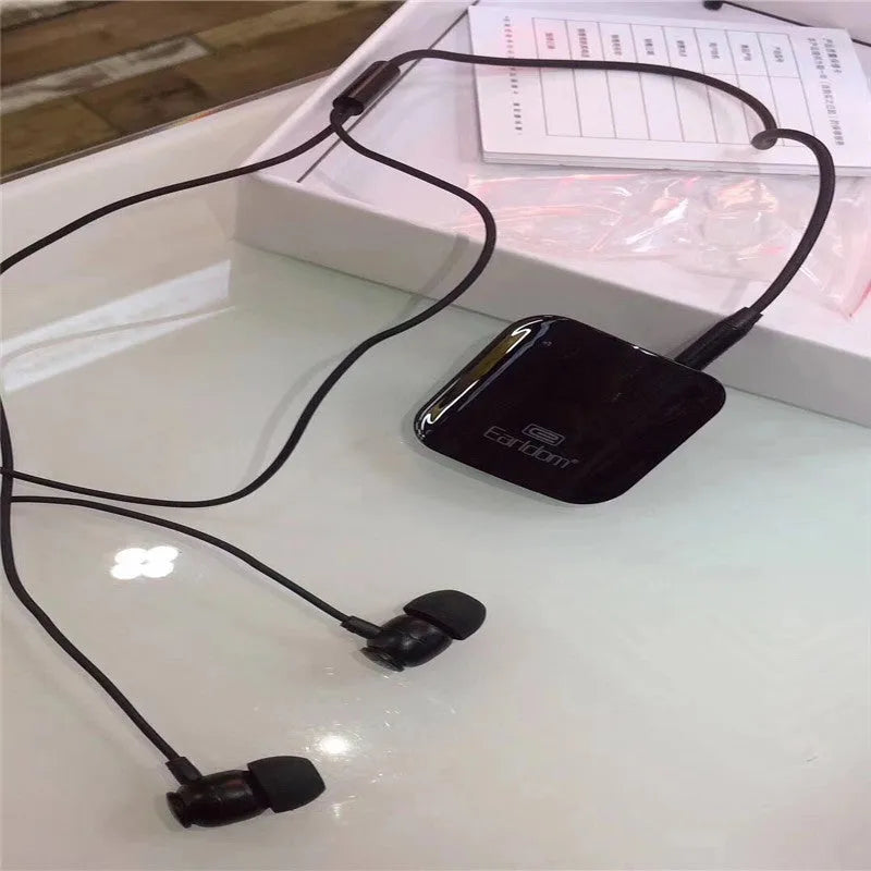 Black Bluetooth audio receiver unit for wireless headphones with lavalier earpiece
