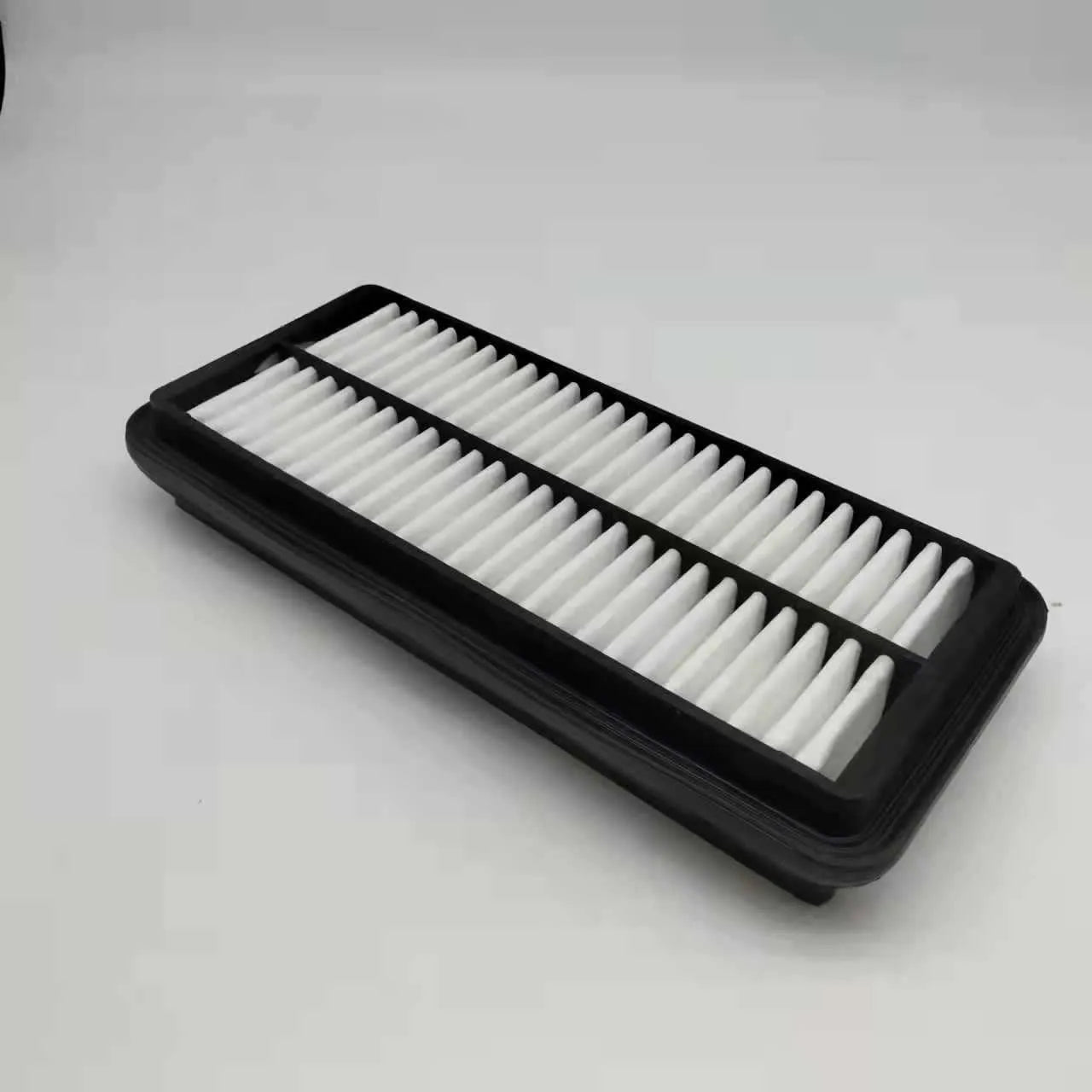 Black car air filter with 256x113x40mm dimensions for modern vehicles
