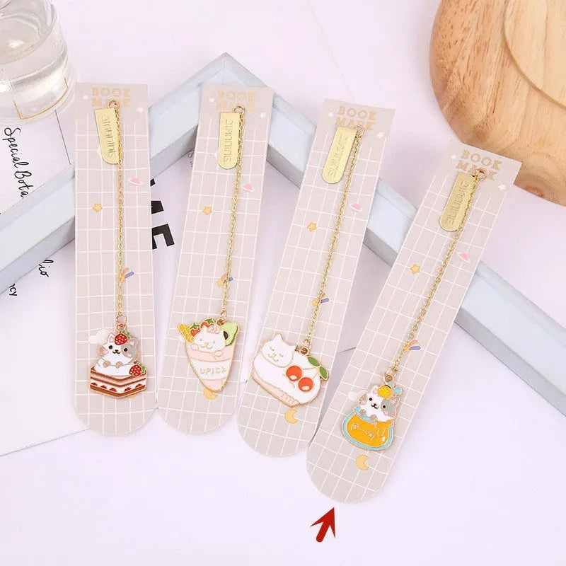 Jane Lime metal cat bookmark with food-themed designs including Strawberry Cake Cat and Cherry Sleeping Cat