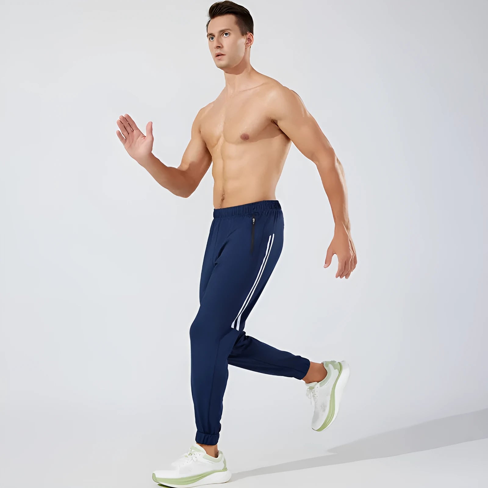 Men's black running trousers with mid waist design and polyester construction