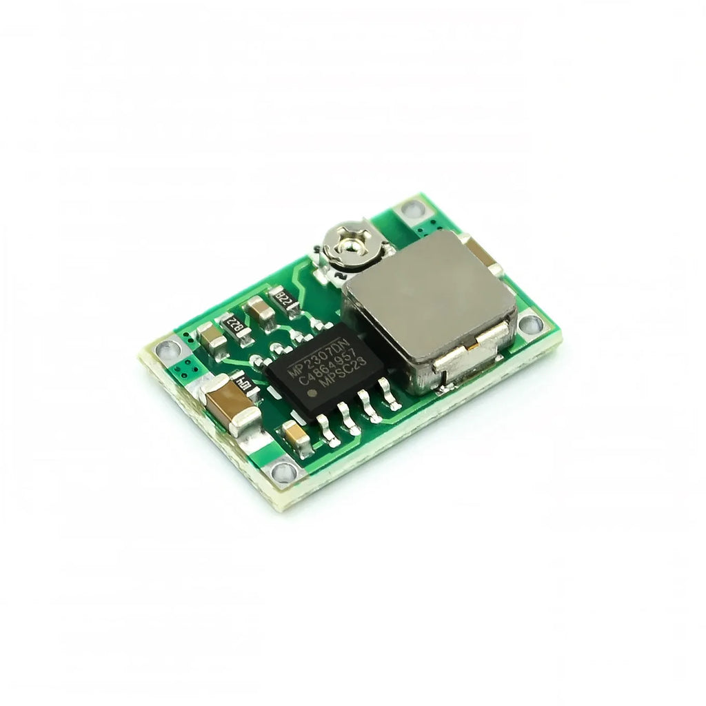 Green Mini-360 DC-DC buck converter module measuring 17x11mm with adjustable output voltage