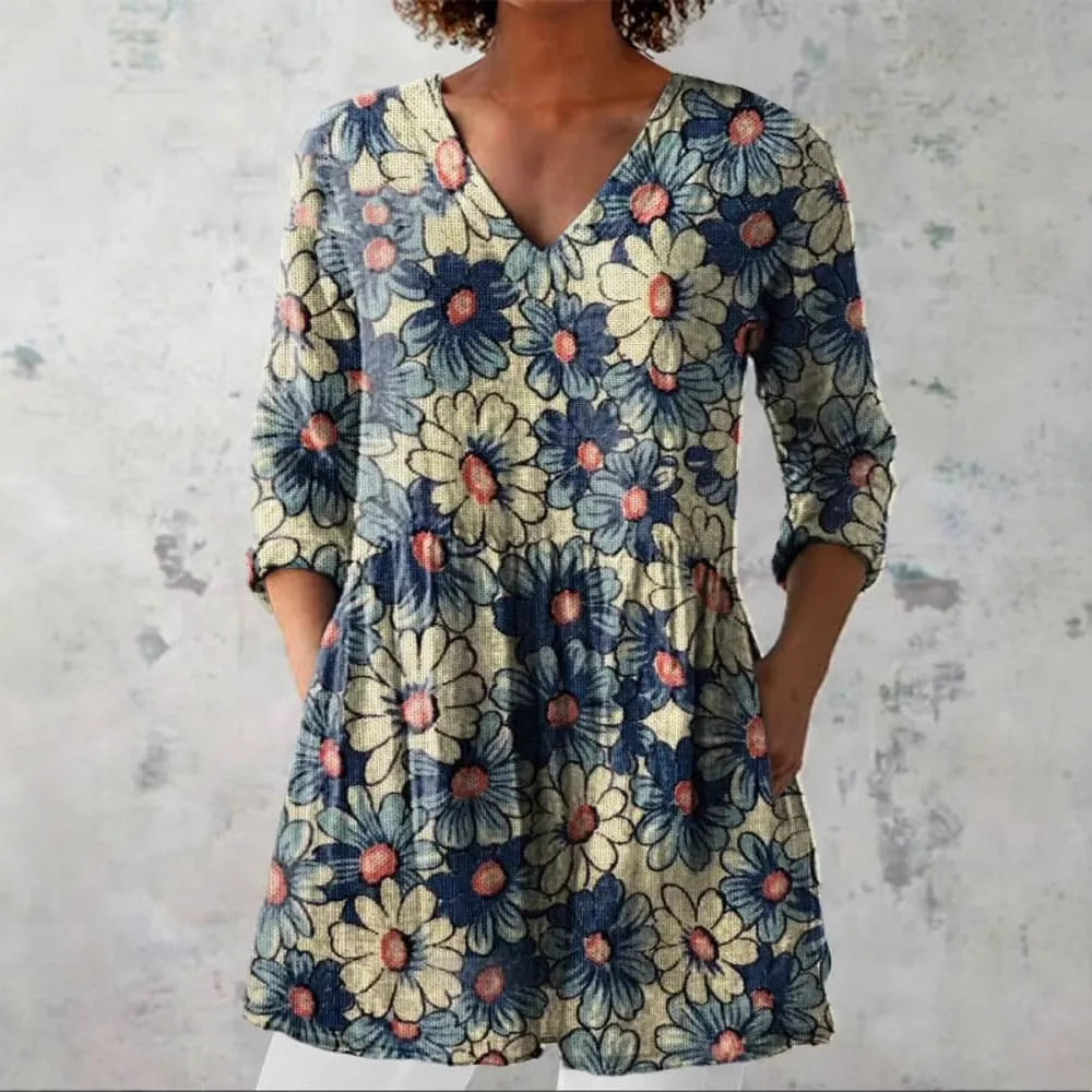 Women's retro style slim fit long-sleeved top with a printed design, shown in one of 12 available colours.