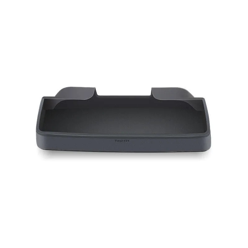 Black silicone sunglasses case mounted in Tesla centre console armrest compartment