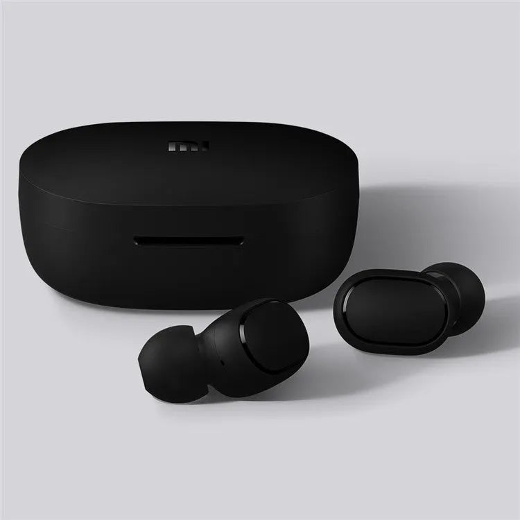 Redmi AirDots True Wireless black earbuds and charging case with three earplug sizes.