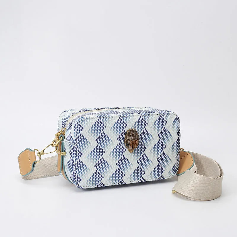 Soft PU camera bag with eagle head wide shoulder strap in blue, outer sandwich pocket, horizontal square shape