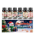 Christmas essential oil set showing six 10ml bottles with festive scents including Christmas cake and gingerbread
