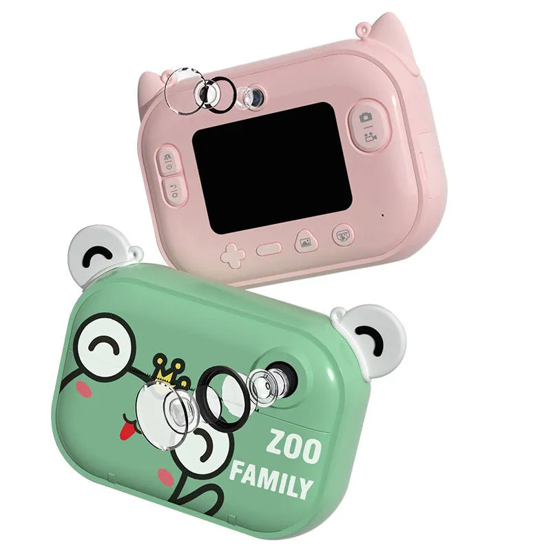 Pink, green, and blue C3 model HD digital instant print camera with 2.4-inch screen on a lanyard.