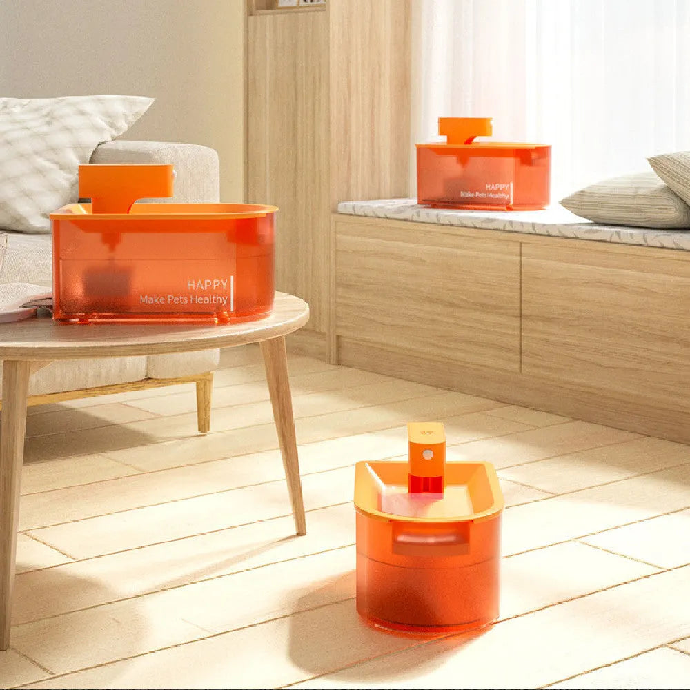 Orange infrared induction pet water dispenser with 1.8 litre capacity and USB cable