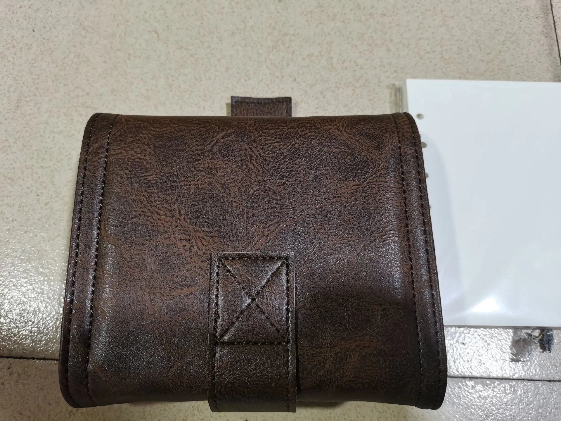 A7 brown PU leather buckle notebook with loose-leaf binding and 40g paper
