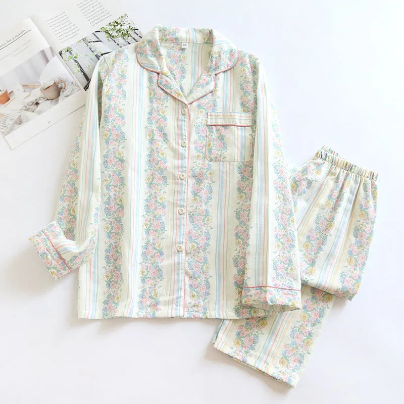 Women's cotton gauze pyjama set with long sleeves and trousers in a colour stripes or fruit print pattern.