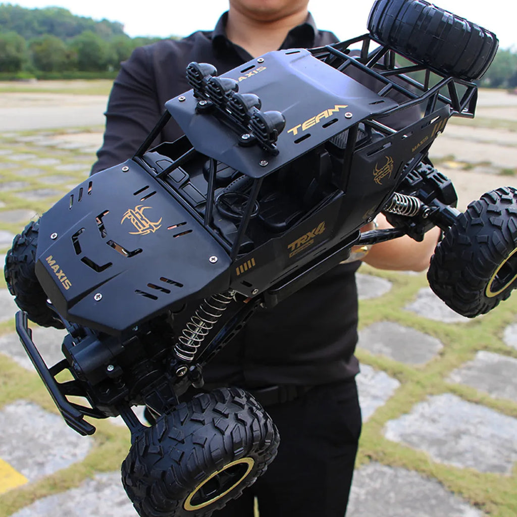 Black and silver remote control cars showcasing 28cm and 37cm four-wheel drive models with wireless controllers