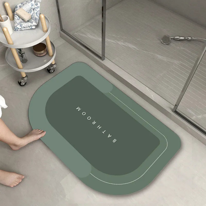 Blended material floor mat in blue colour with oval shape on bathroom floor