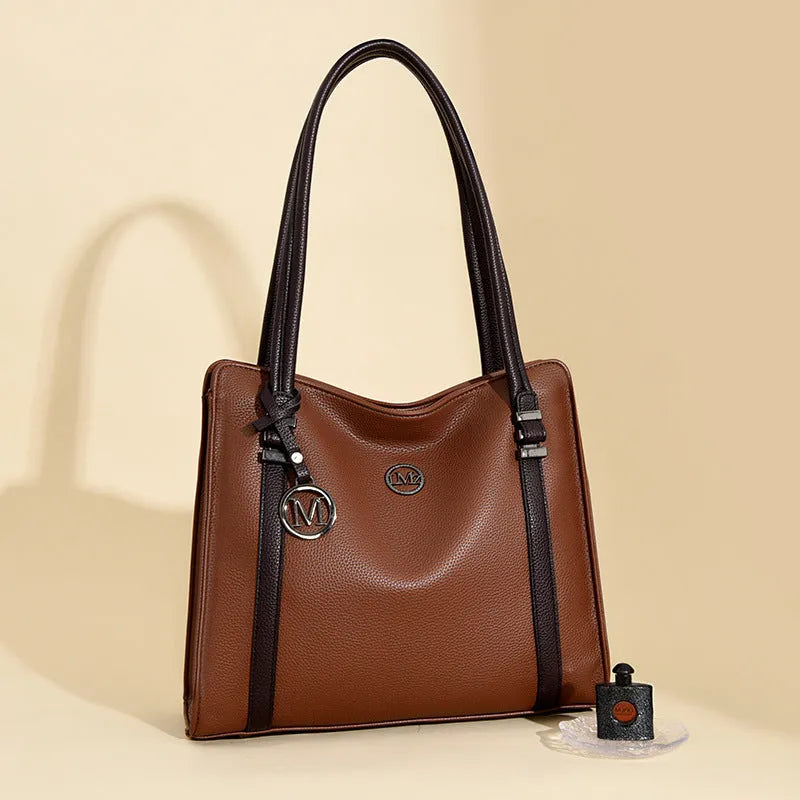 Soft PU leather women's crossbody bag in retro style with double straps, shown in a choice of five colours.