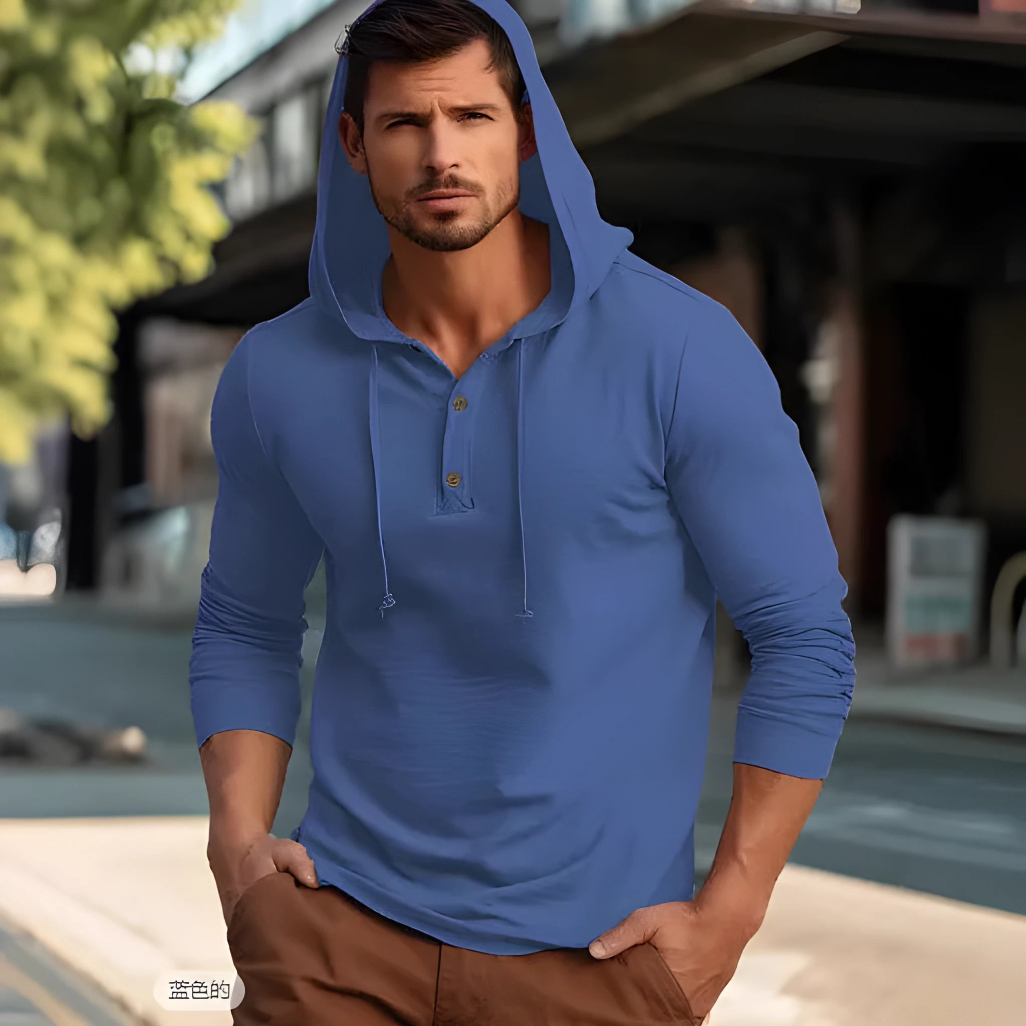 Man wearing a dark blue cotton pullover hoodie top with long sleeves, showing loose casual fit.