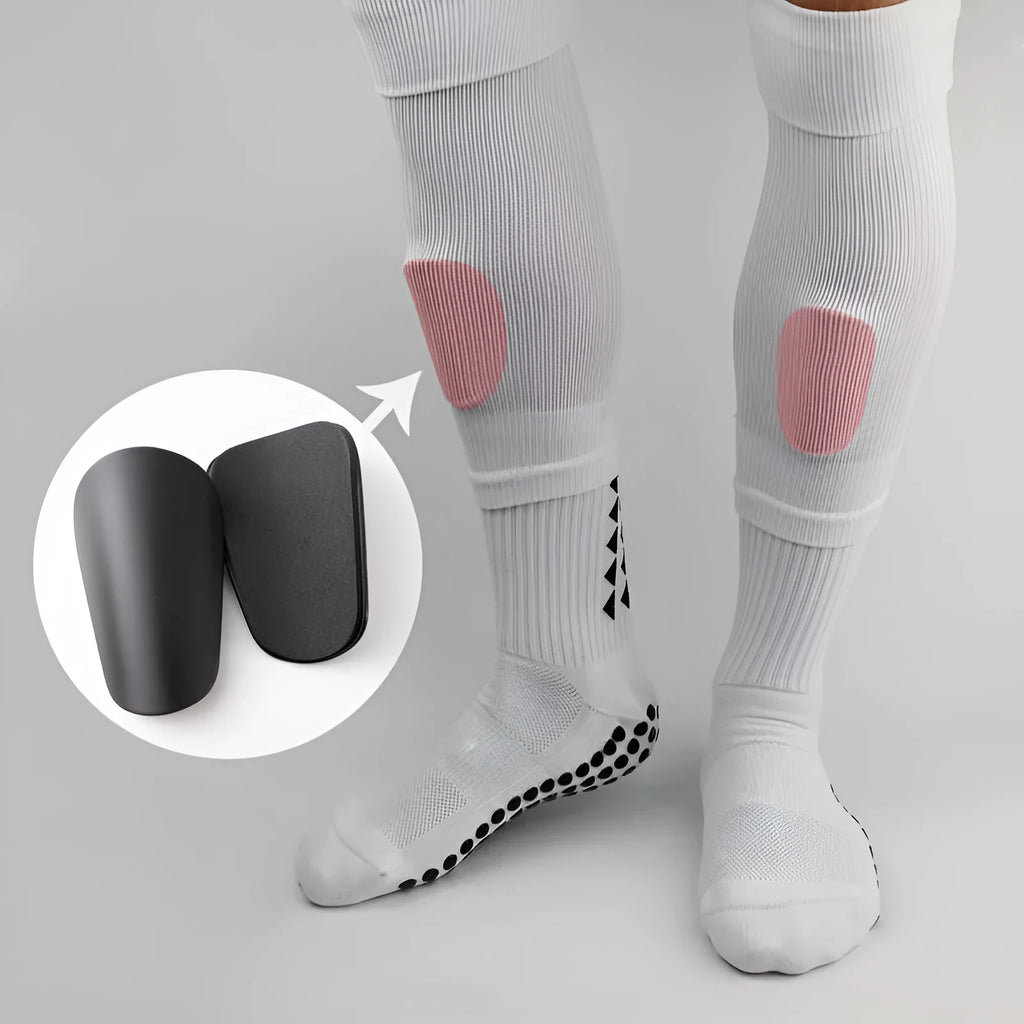 PU mini shin guards in black, white, red, and blue colours for football and sports protection.