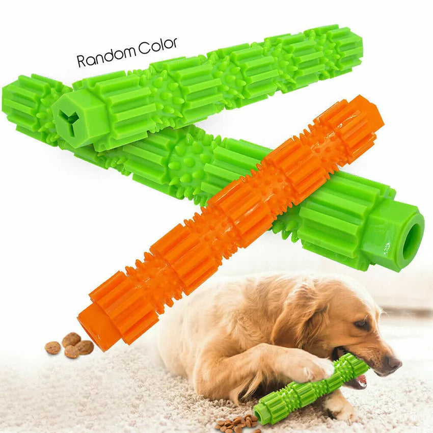 Green and orange natural rubber dog chew toy with treat holes and squeaker for small to medium aggressive chewers.