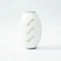 Green and white washable reusable gel lint roller ball for pet hair removal.