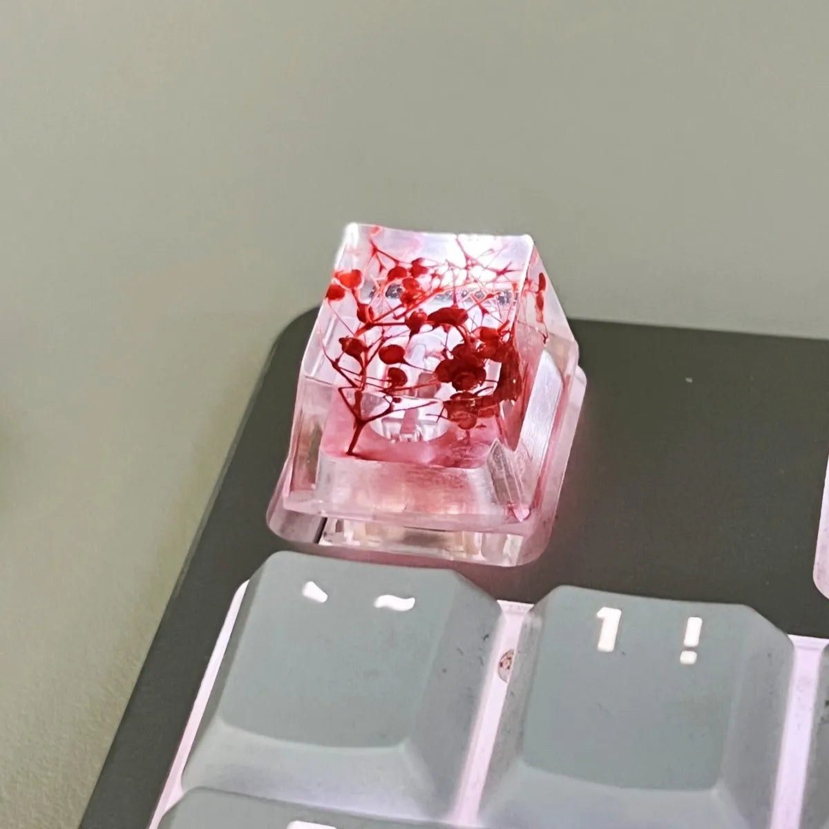 Transparent resin mechanical keyboard keycap with starry sky design in one of four colour options