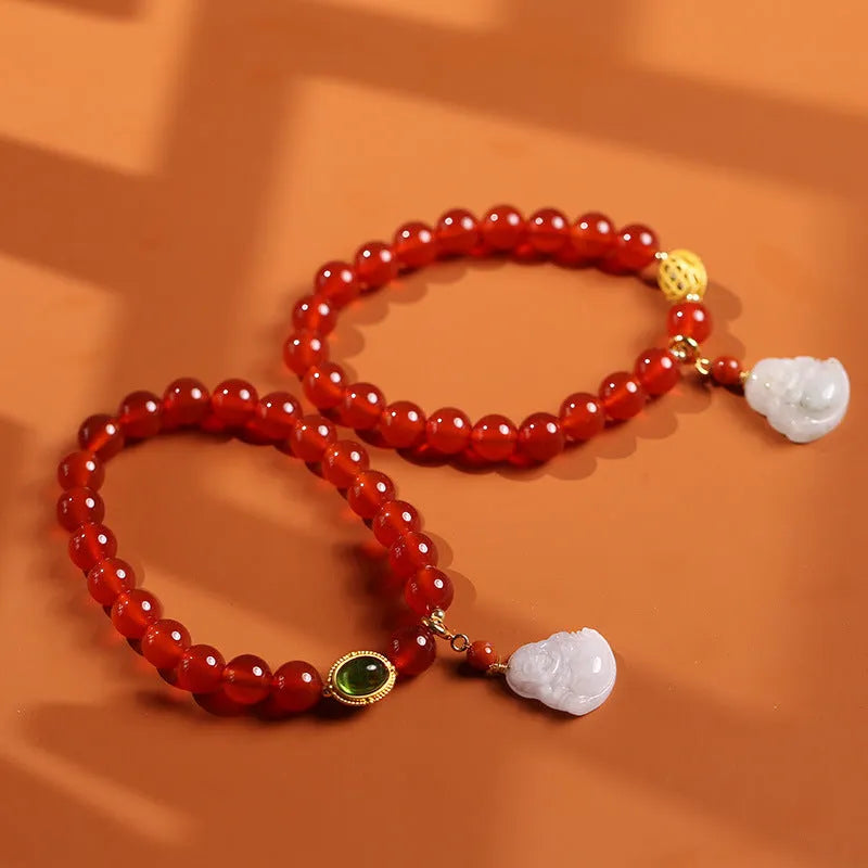 Handmade red agate and amber bracelet with Maitreya Buddha charm in Chinese geometric style.