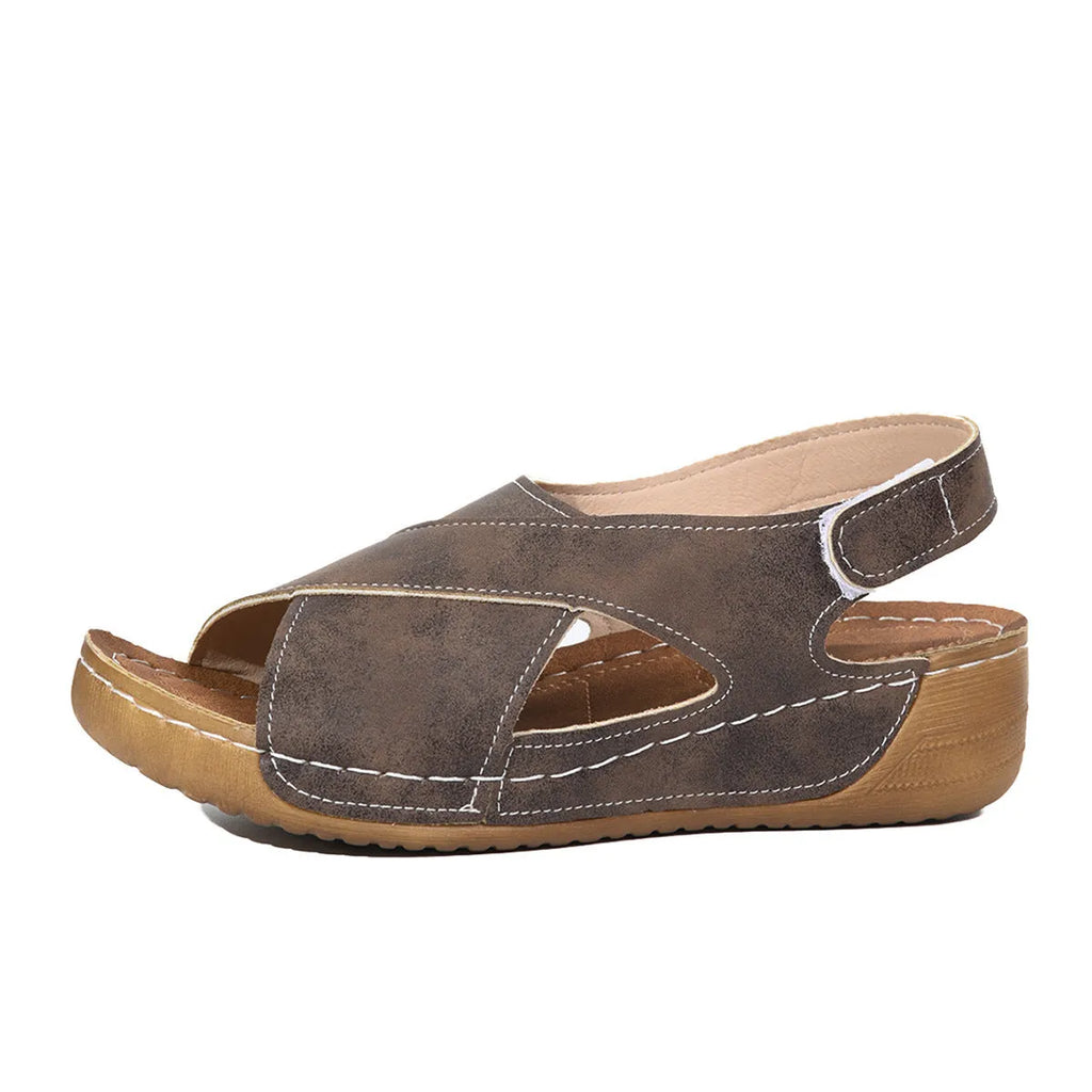 Roman platform wedge sandals with Velcro strap in coffee colour on a rubber sole.