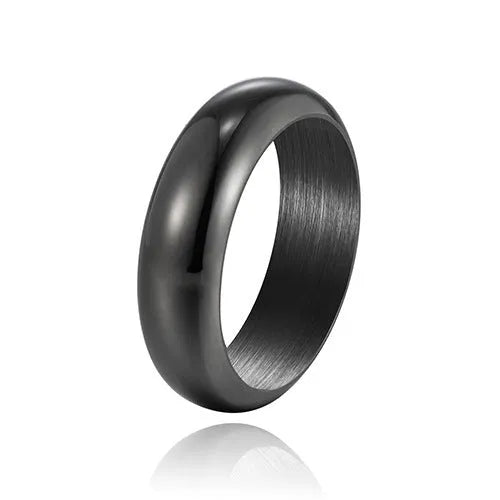 Glossy electroplated titanium steel ring in gold, black and steel colours showing detailed finish