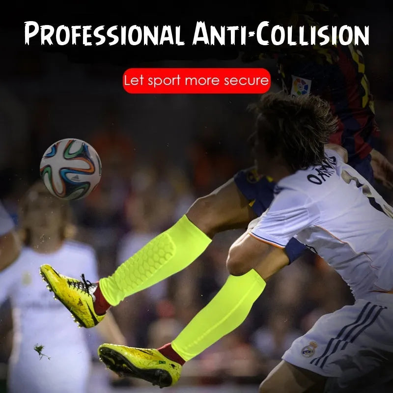 Black lycra football shin guard holder with silicone band on a leg showing secure fit