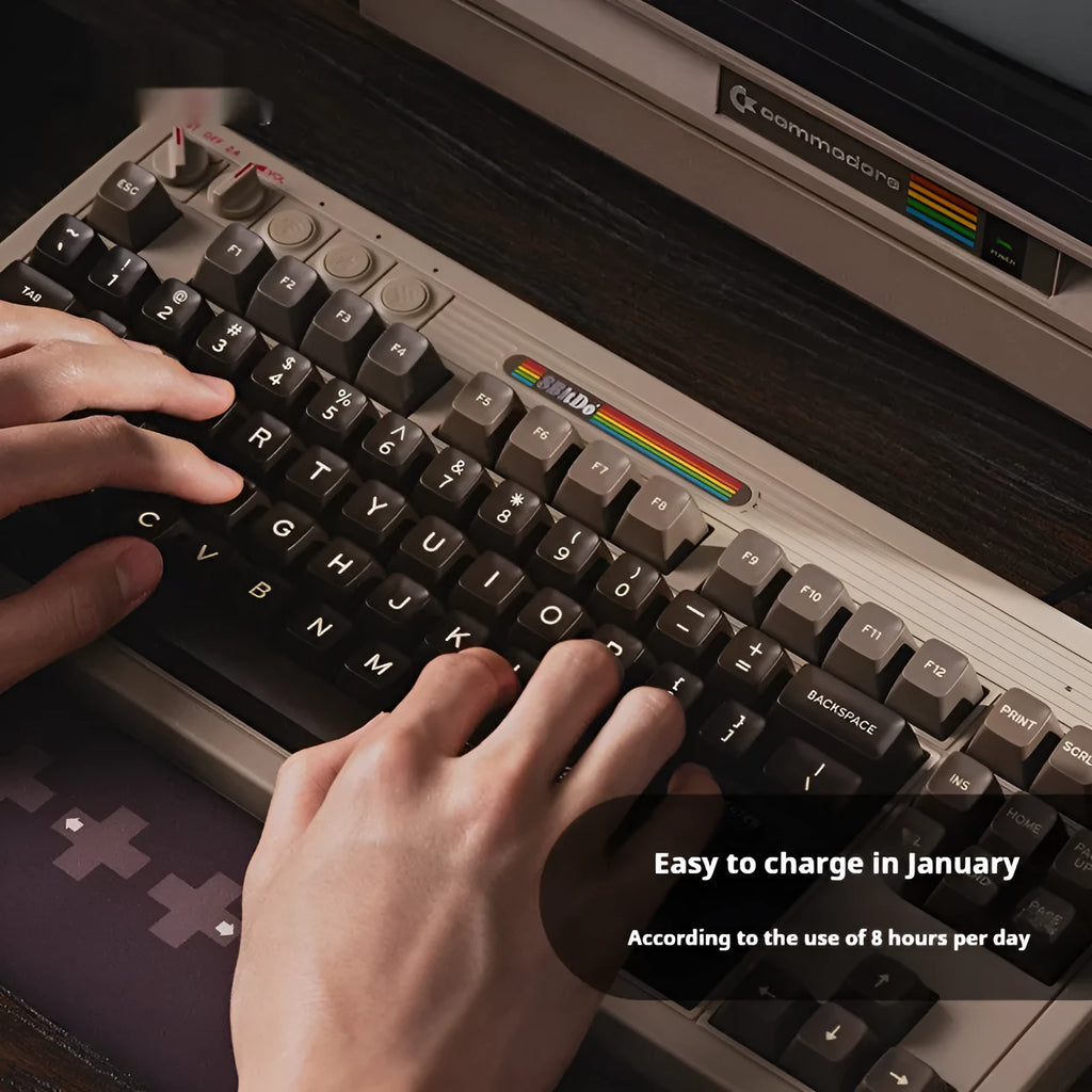 Retro C64-style wireless Bluetooth mechanical gaming keyboard with ABS construction on desk