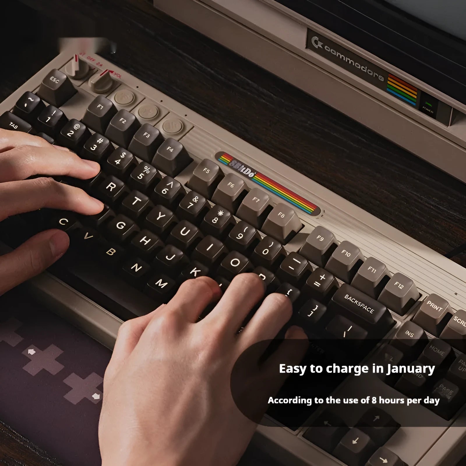 Retro C64-style wireless Bluetooth mechanical gaming keyboard with ABS construction on desk
