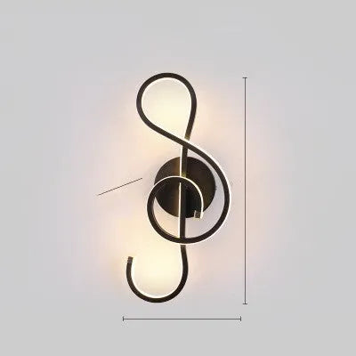 Nordic minimalist LED wall lamp with silicone shade in black finish mounted beside bed