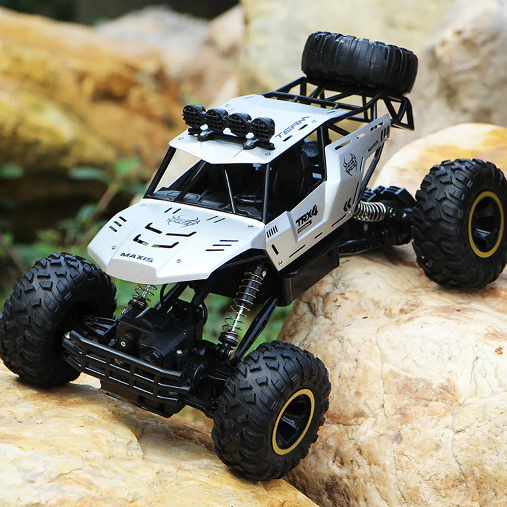 Black and silver remote control cars showcasing 28cm and 37cm four-wheel drive models with wireless controllers