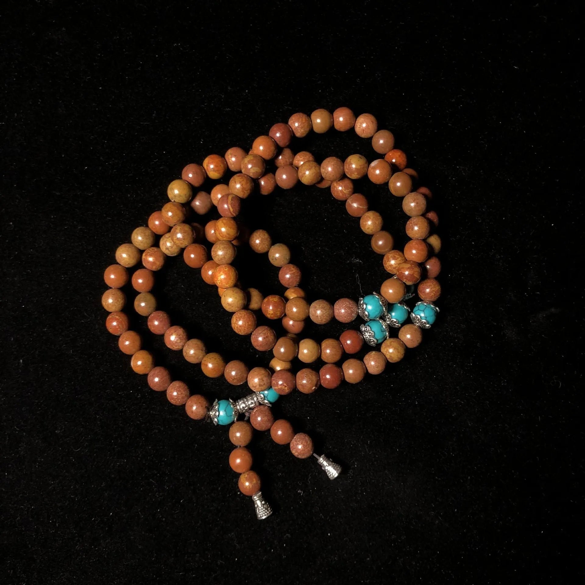 Handmade stone bead bracelet with 108 geometric lvzhu beads measuring 5-6mm