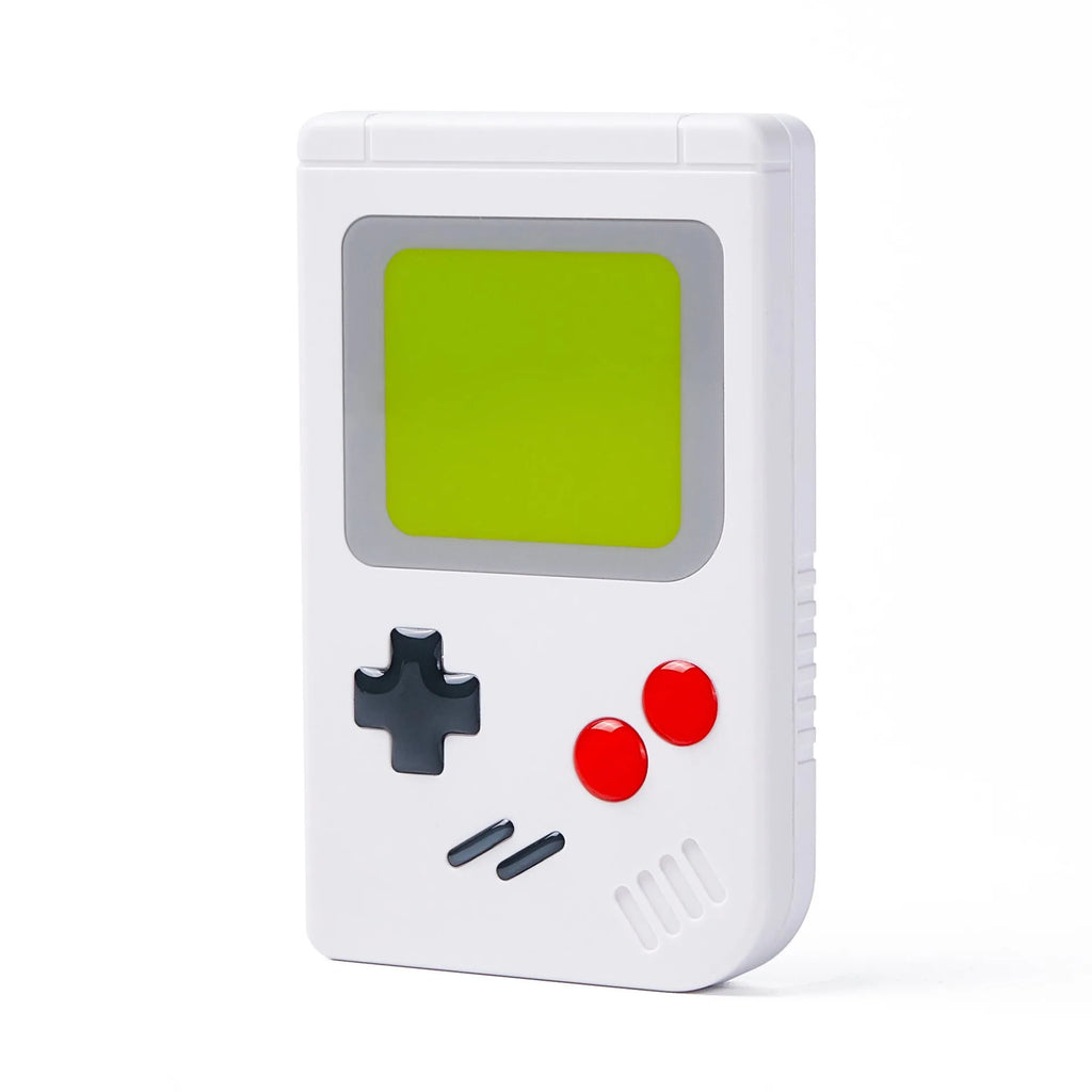 Slim white Nintendo SWITCH game card storage box for OLED and LITE models on a table.
