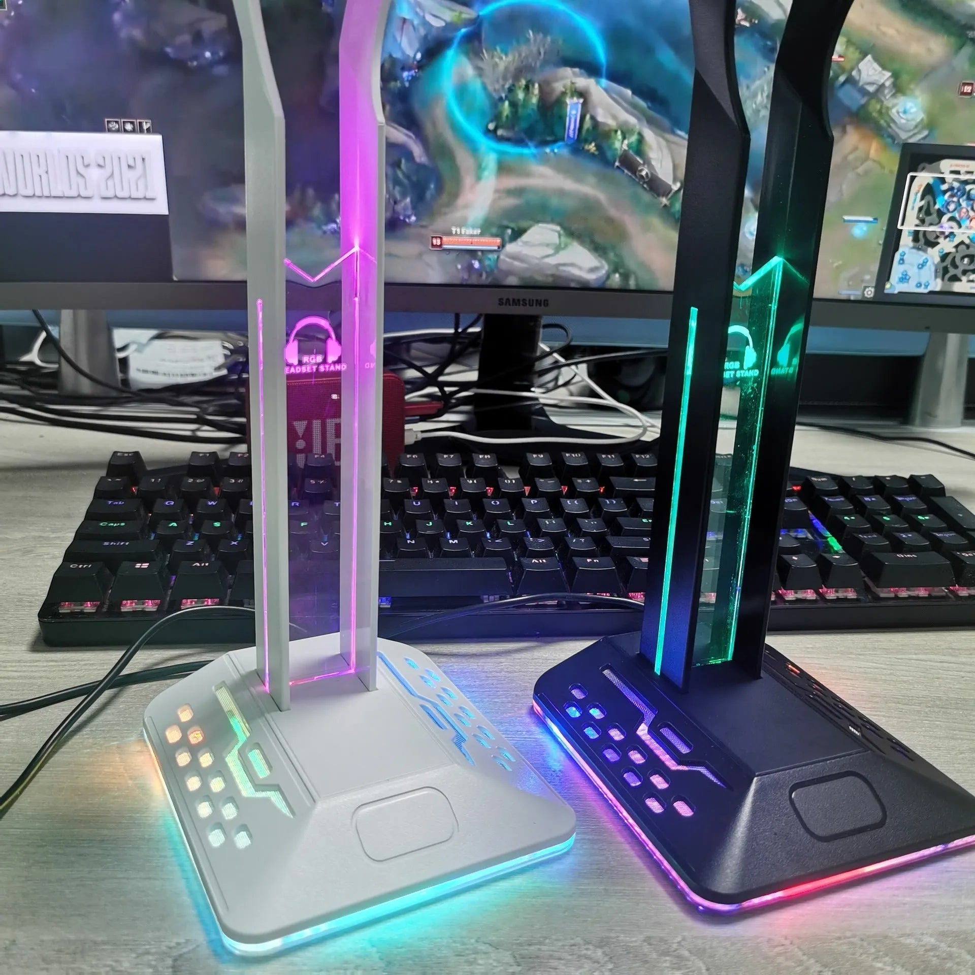 RGB headphone display stand with dual USB ports in black acrylic on a desk