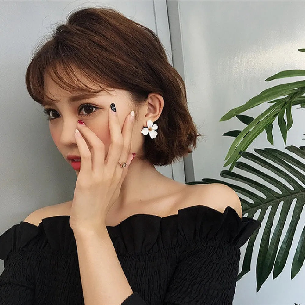 Flower shaped stud earrings for women in pink and white colours